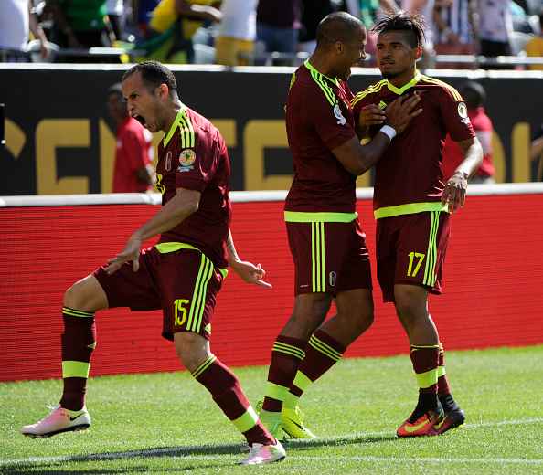 CHICAGO, ILLINOIS - JUNE 05: Josef Martinez of Venezuela celebrates with teammates after scoring the opening goal during a group C match between Jamaica and Venezuela at Soldier Field Stadium as part of Copa America Centenario US 2016 on June 05, 2016 in Chicago, Illinois, US. (Photo by Matt Marton/LatinContent/Getty Images)