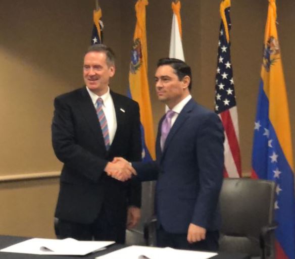 EEUU y gobierno interino firman convenio bilateral